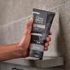 imageDOVE MEN  CARE Body and Face Scrub Eucalyptus Deeply Exfoliates for Hydrated ampamp Nourished Skin 100 Gentle Cleanser No Sulfate Cleansers or Parabens 9 ozCharcoal  Clove